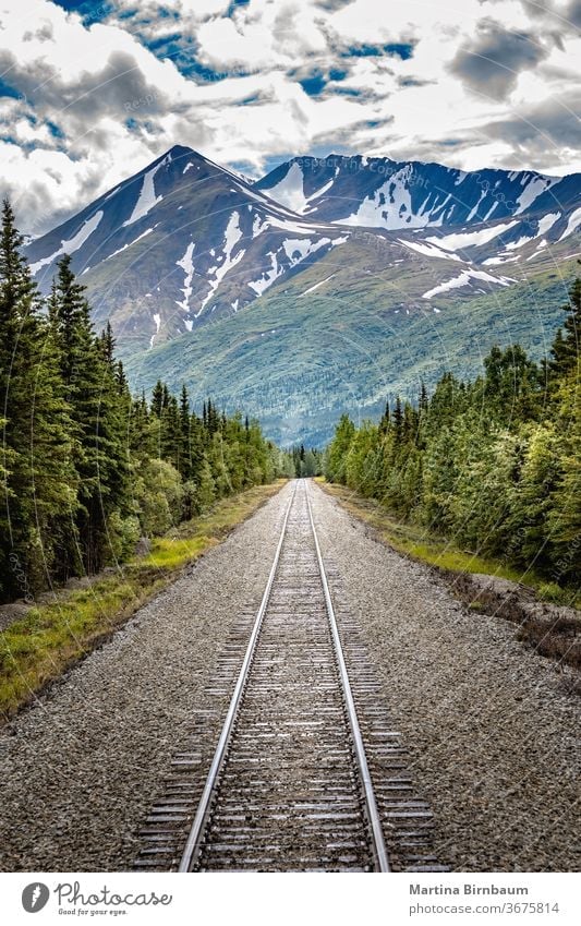 Railroad to Denali National Park, Alaska with impressive mountains journey denali railway railroad alaska national park background beautiful blue brown color