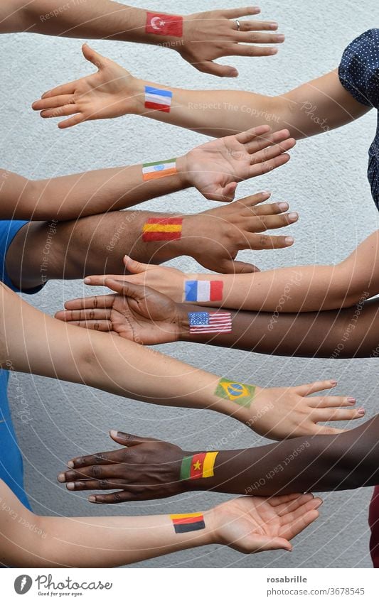 People from different countries | Neighbourhoods people International nations disparate in common Flags flags Arm hands togetherness at the same time diversity