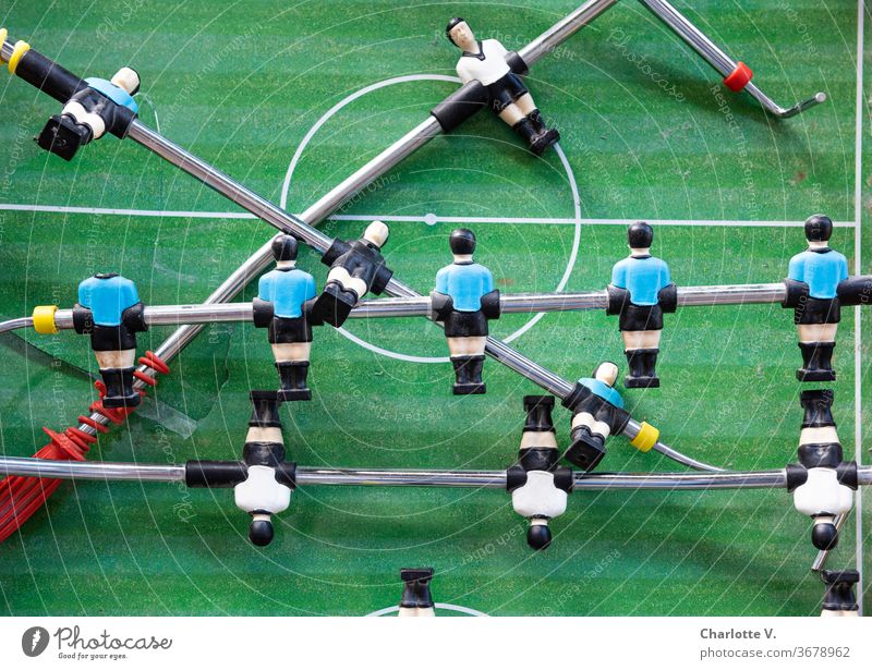 pack formation | broken table football table soccer kicker Sports Ball sports Football pitch Leisure and hobbies green Colour photo Fiasco Table soccer Broken