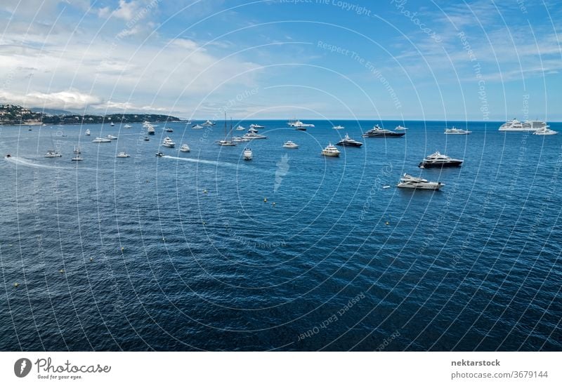 Yachts Sailing on the French Riviera Sea yacht boat sailing horizon water horizon over water seascape sky cloudscape distant summer day natural lighting Monaco