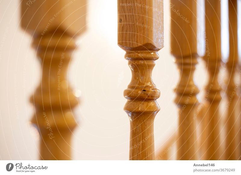 Wooden Railing of an luxury antique staircase, woodwork elements macro photograpy, retro design beautiful interior of a modern house railing home closeup wooden