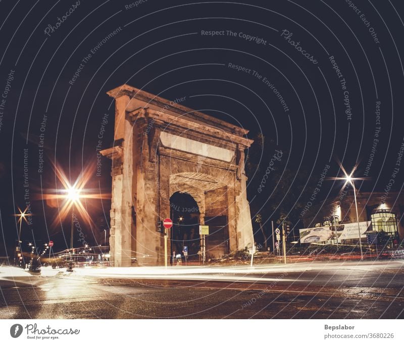Night view of Porta Romana in Milan, Italy architecture portal sunset light heritage city Italian art arched sculpture tourism travel historic history old
