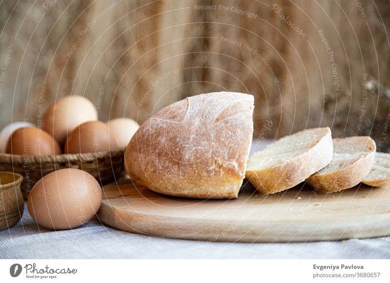 Loaf of fresh homemade bread. Still life rustic style. appetizer background bakery beverage breakfast brown clean closeup cloth composition dairy delicious diet