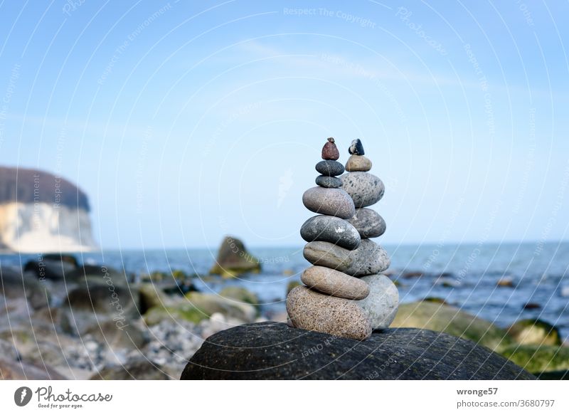 2 cairns are standing on a big boulder on the beach of Rügen's chalk cliffs Limestone rock chalk coast Baltic Sea Baltic coast Beach Cairn Stone Man rock mandl