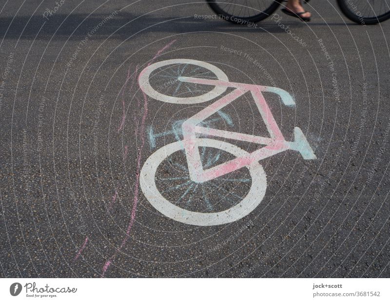transport by bicycle Pictogram Signs and labeling Sunlight Snapshot Partially visible Street art painted on Traffic infrastructure Symbols and metaphors Wheel