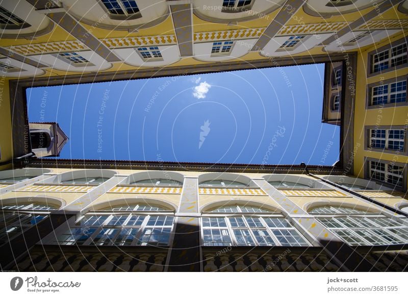 contrasts, deep blue sky with white spot Facade Backyard Symmetry Style Historic Beautiful weather Worm's-eye view Interior courtyard Window Architecture Sky