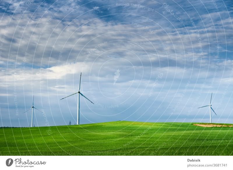 Wind turbine in the field. Wind power energy concept wind generator industry electricity alternative landscape green clean nature renewable environment