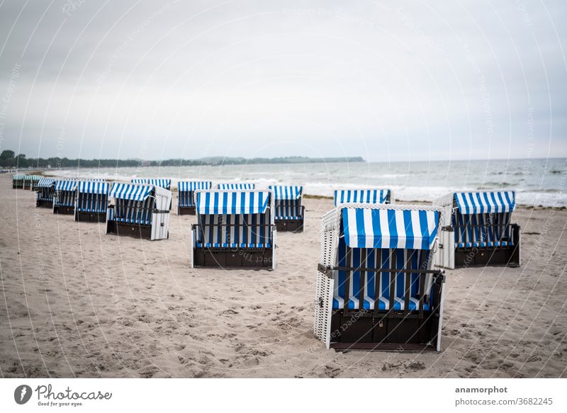 Beach chairs at the Baltic Sea in the early morning in Boltenhagen Ocean beach chair Waves Vacation & Travel Sand Coast Relaxation Summer Sky Water Tourism