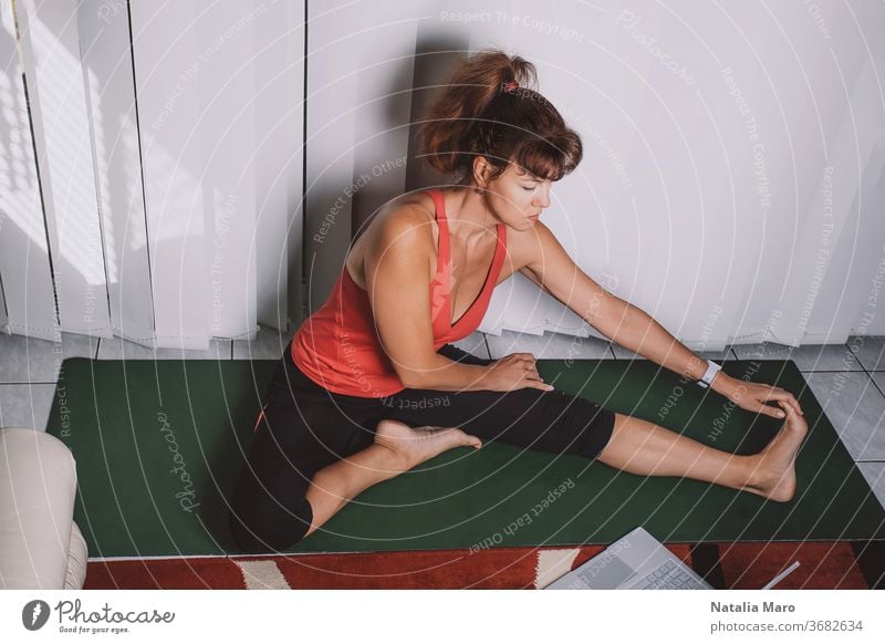 Free Stock Photo of Women doing online yoga at home