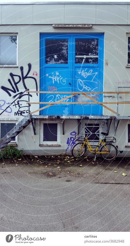 Bike in front of cheap dosshouse Bicycle Stairs Entrance Blue Handrail makeshift Banister Architecture Upward Yellow Downward Landing