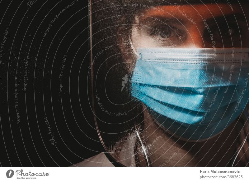 Female doctor with face shield on black background covid-19 coronavirus 2020 air mask choose clinic corona doctor corona epidemic corona vaccine