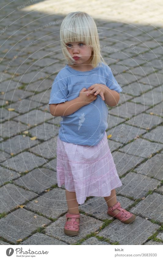 ...and the game is suspended due to injury... Child girl Playing Summer Small Toddler Skirt Summery Summer's day Blonde 1 Earnest Seriousness Sulk Pout hands