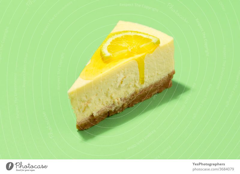 Cheesecake slice with lemon syrup topping. Slice of cheesecake close-up background baked bakery baking breakfast bright christmas citrus classic colors cooking