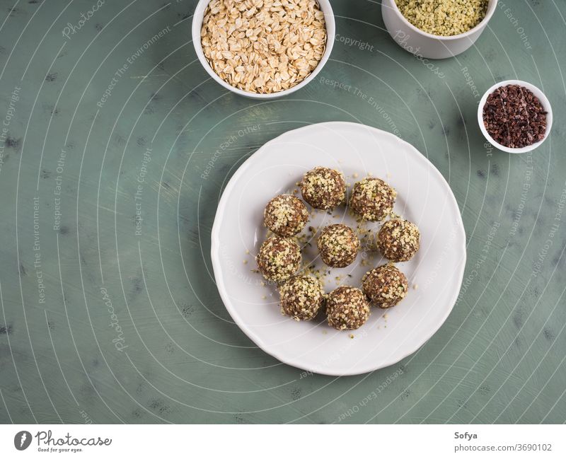Energy protein balls with nuts, hemp seeds energy balls bites almond butter flax dessert dark chocolate cocoa oats nutrition low sugar oatmeal date apricot