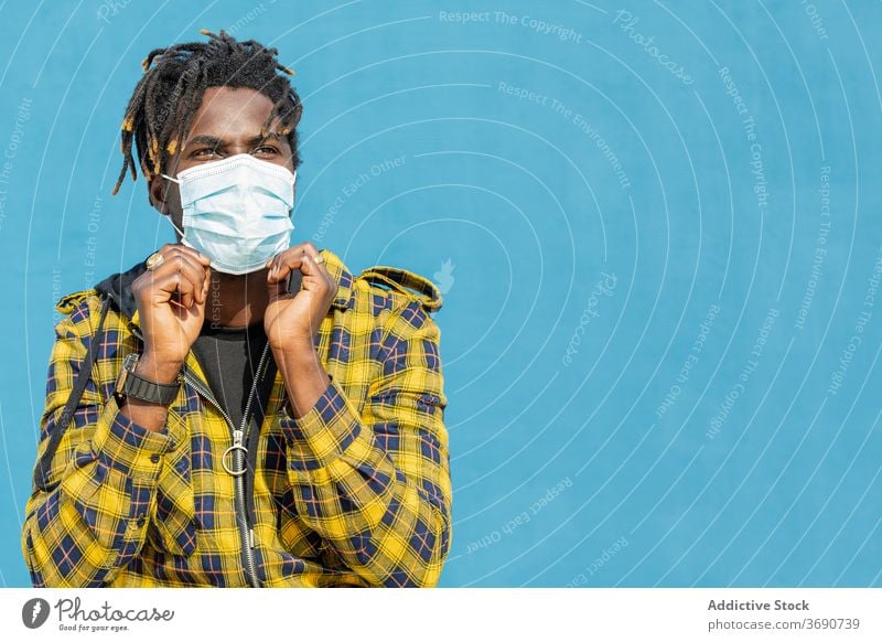young black man wearing a protective mask person portrait african protection disease copyspace virus male epidemic flu health face coronavirus medical care