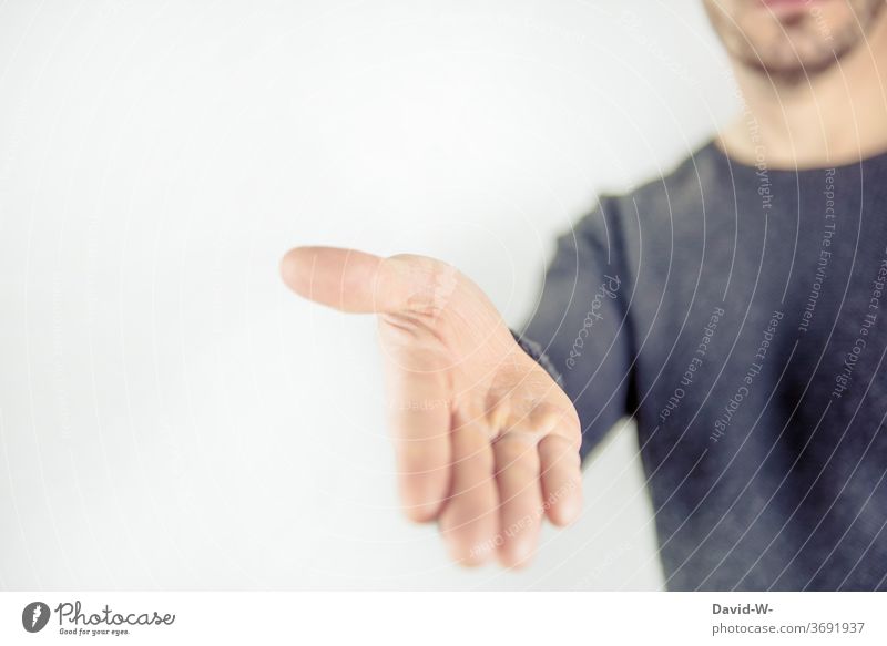 phrase - reaching out to someone | man reaching out Reaching out to someone by hand Human being Man stretch out by hand extend a hand peace offer Apology