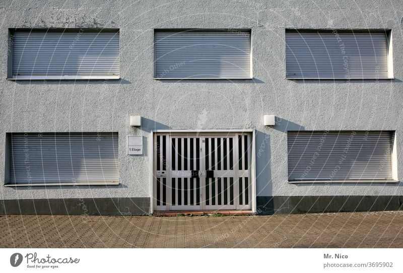 5 windows and one door Facade Window House (Residential Structure) Building Architecture roller shutter Shadow Apartment house nobody there nobody at home