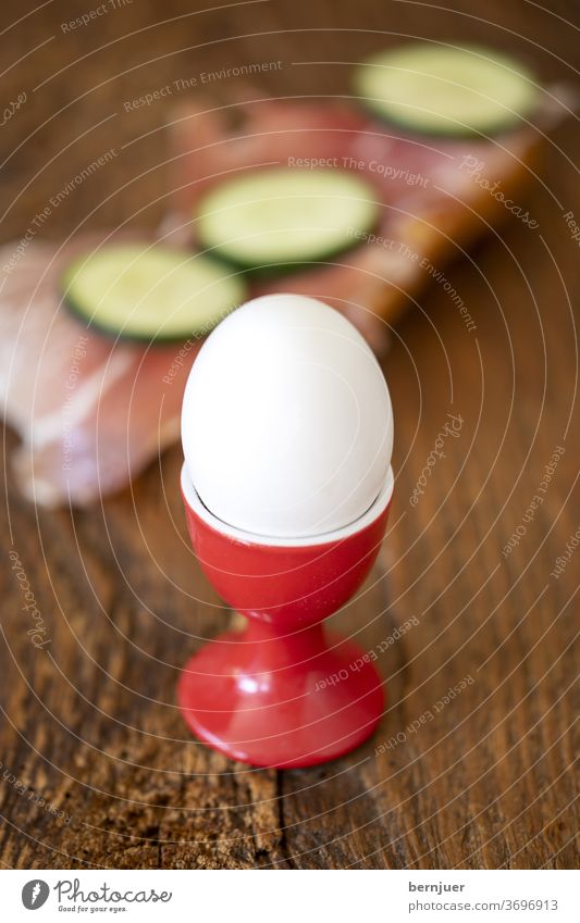 boiled egg and bread with ham Egg Egg cup Close-up Eating ham sandwich Bread Fresh Breakfast salubriously background single one seethed natural Protein White