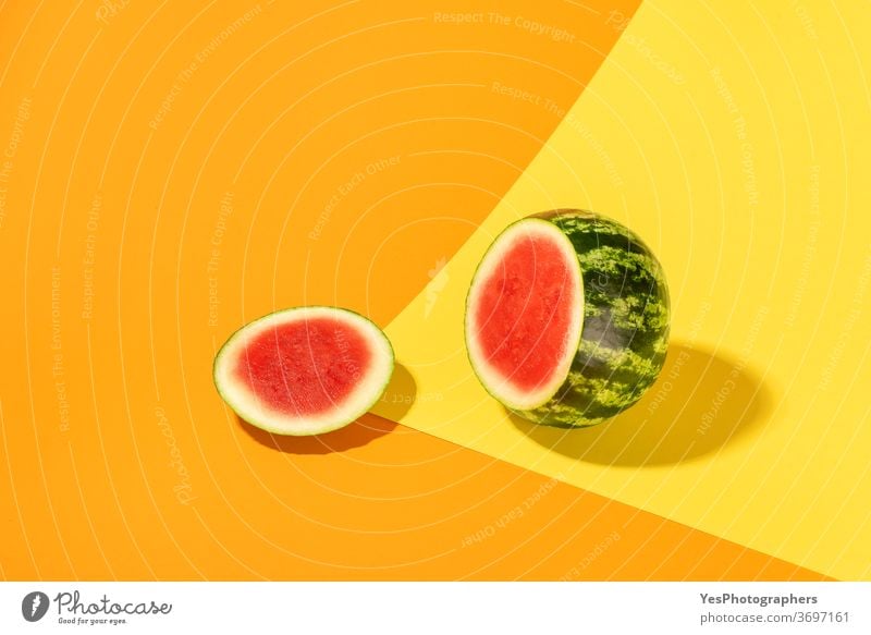 Watermelon isolated on colorful abstract background. Sliced watermelon creative layout bright colored cut cut out deck detox diet food fresh fruits green