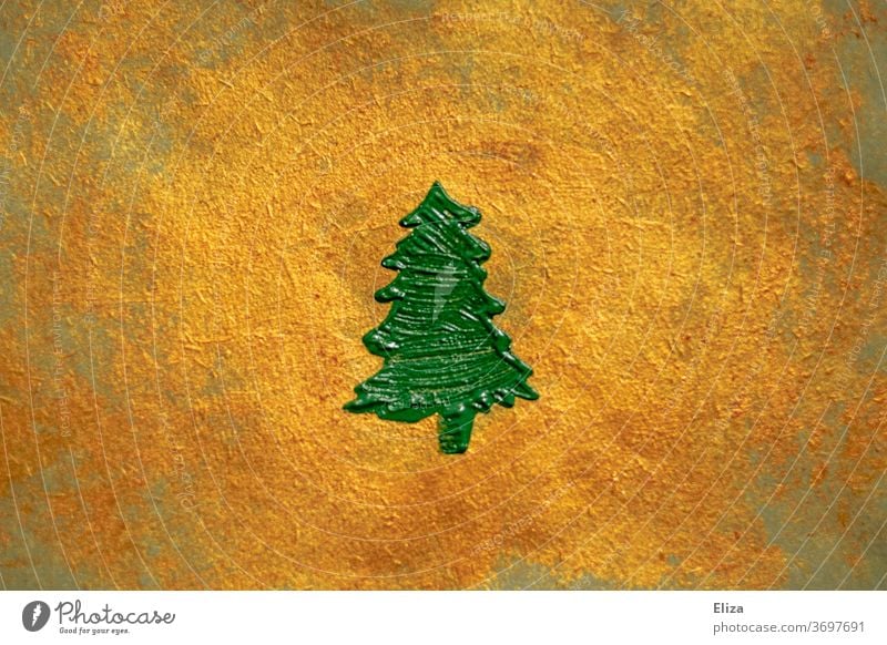 green painted fir tree on a gold shimmering background. Christmas. Fir tree Gold golden christmas tree Noble Decoration texture Christmas & Advent Painted