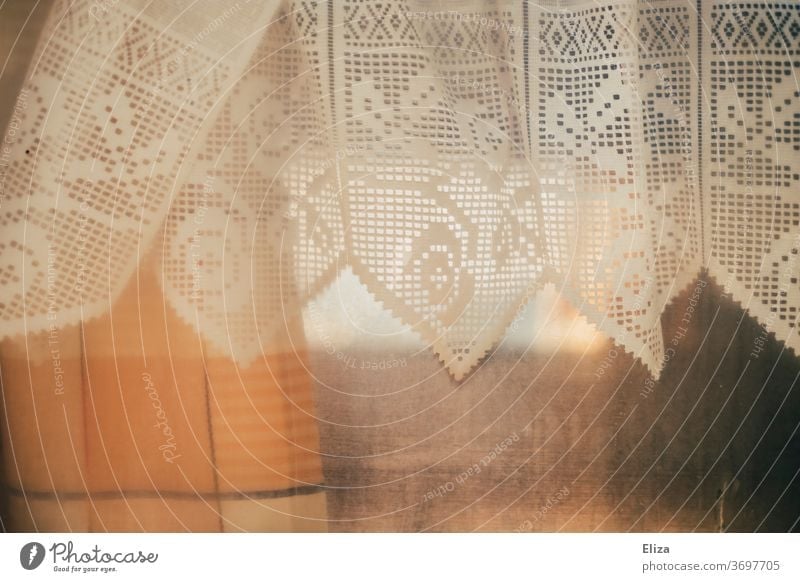 Caravan romance. Window of a caravan with lace curtains. Point stale Retro atmospheric Misted up Dreary Drape Curtain Living or residing Cloth White