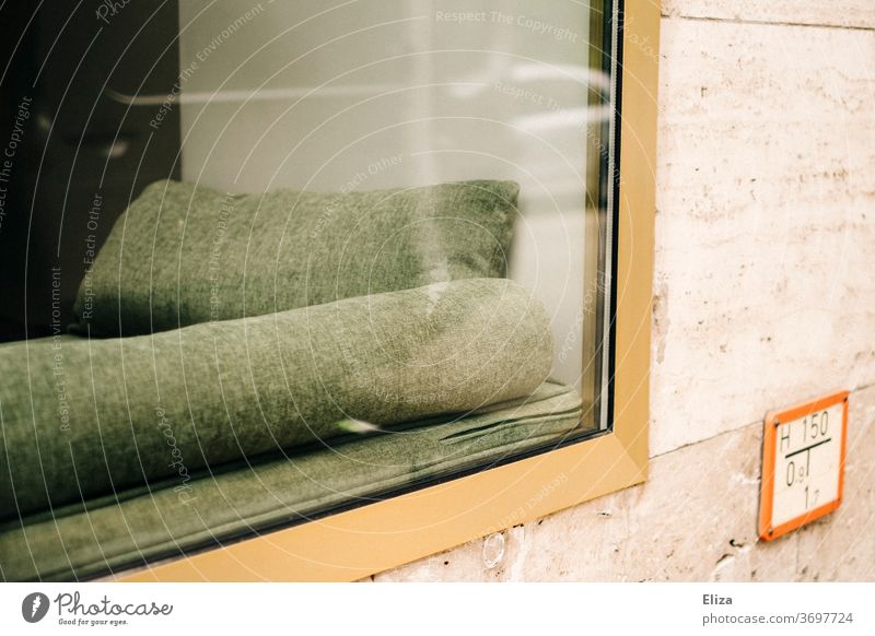 Green cushions and shield whose meaning I do not know Shop window Café Retro green Bolster Cozy Window Facade Lounges Furniture Cushion Velvet look in