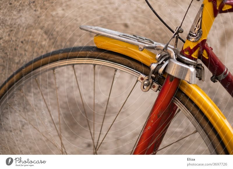 Detail of a red golden vintage road bike Racing cycle detail Wheel Bicycle Retro Red Gold already Hipster Means of transport