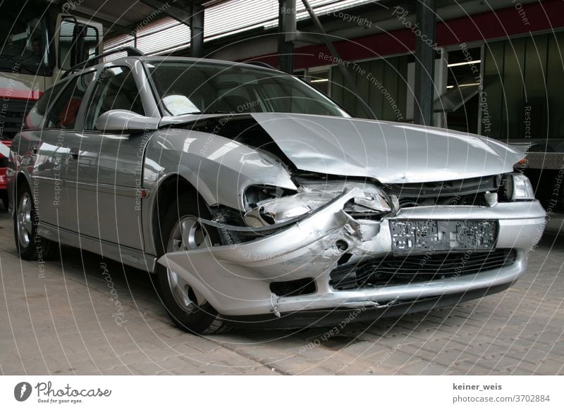 Silver-grey accident car after traffic accident with total loss Car involved in an accident Car accident Total loss Traffic accident Accidental damage