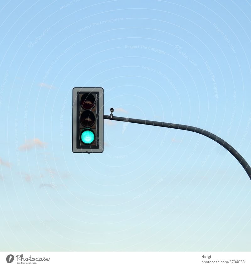 GREEN - traffic light with green signal in front of blue sky Traffic light light signals light sign system Transport Road traffic Traffic infrastructure