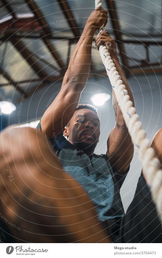 Athletic man doing wall ball exercise. - a Royalty Free Stock Photo from  Photocase