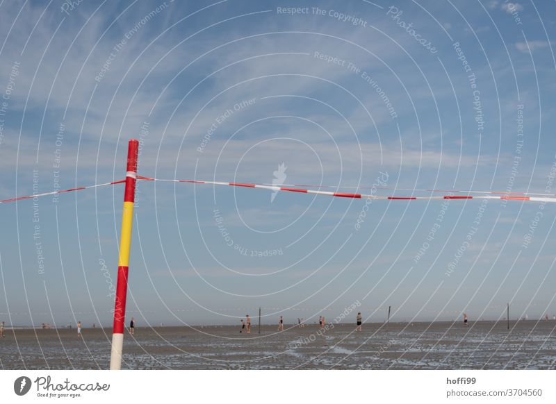 Bars in the mudflats with flutter band - bathing area poles Marker line Mud flats Swimming pool guarded beach Beach North Sea Water Sand Sun Sky Low tide Ocean
