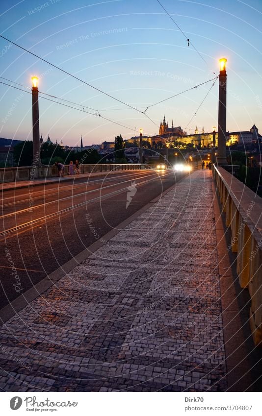 Manes Bridge with St. Vitus Cathedral and Prague Castle in the evening Hradcany Church Dome bridge Perspective vanishing point perspective Malá Strana
