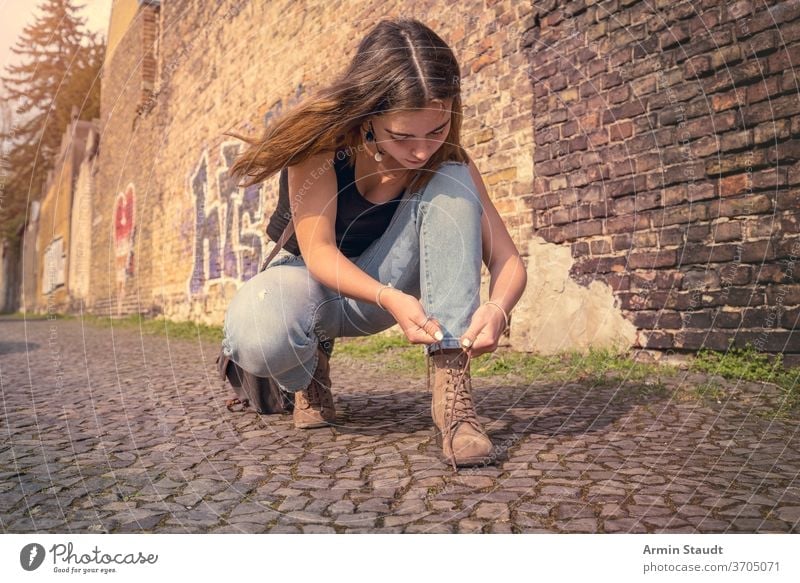 Details Of Womens Clothes And Shoes On A Street Stock Photo