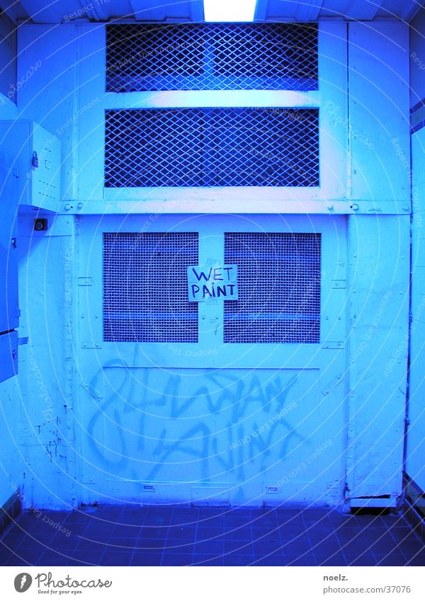 DOOR WET PAINT. Light Hut Dim Canceled Photographic technology Door Blue graffiti wet paint nailed blue light Colour