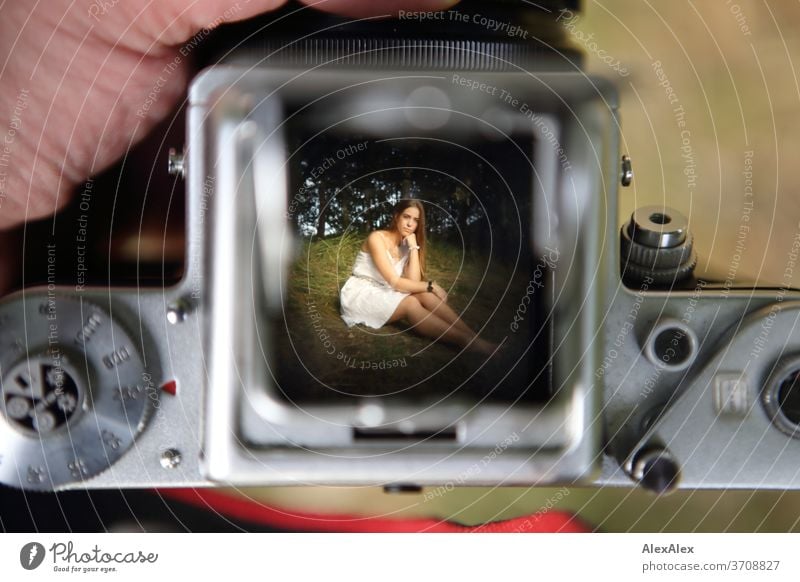 View of the light shaft of an analogue camera at the picture of a young woman with white dress in nature Light Athletic Feminine Emotions emotionally portrait