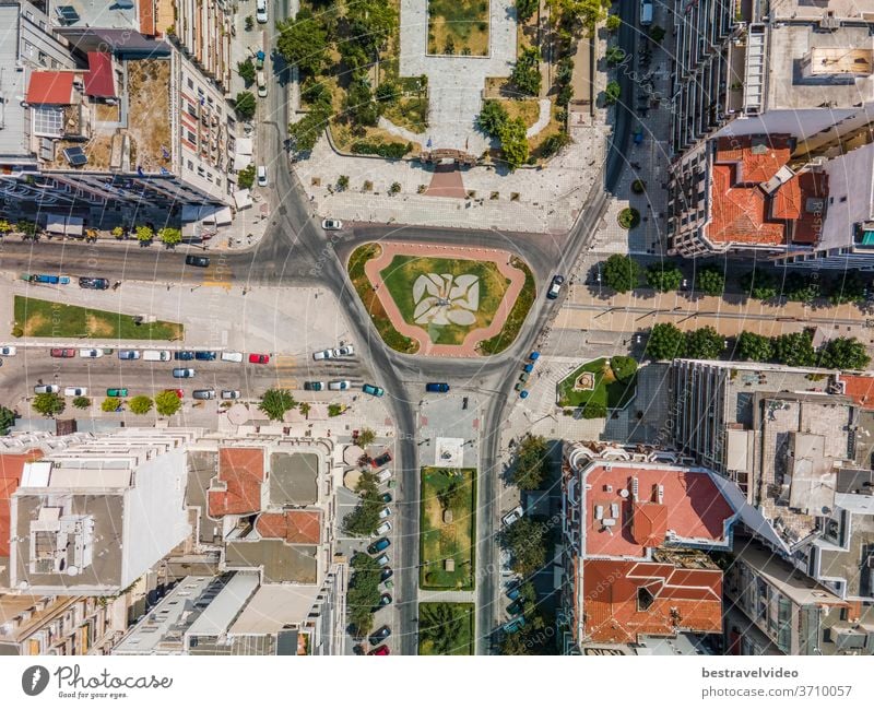 Thessaloniki, Greece aerial drone view of Agia Sofia square. Day top panorama of a European city with buildings around road & pedestrian area.