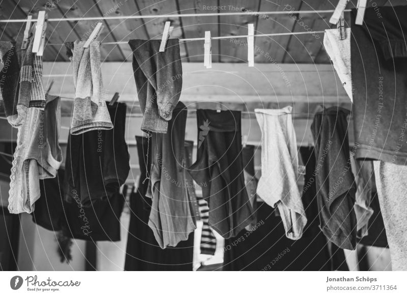 Laundry on the line in a carport - a Royalty Free Stock Photo from Photocase