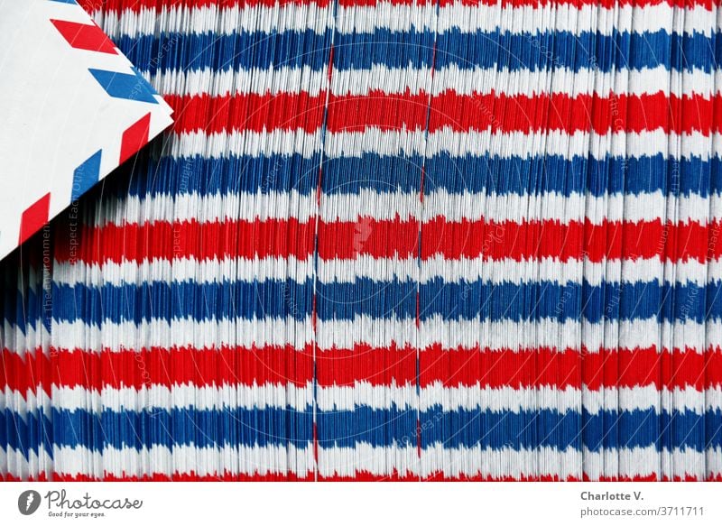 Airmail envelope play | red-white-blue horizontal stripes Structures and shapes Things Stripe Red Blue White Abstract Pattern Colour photo Close-up Design