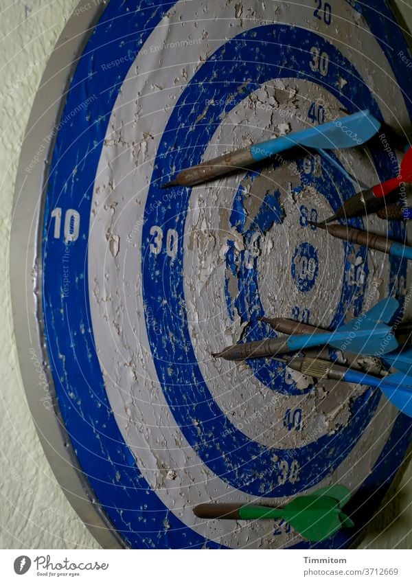 just beside it (update) | even after years of practice Darts Dartboard Wall (building) Old Broken traces of use Arrow Playing Target Leisure and hobbies figures