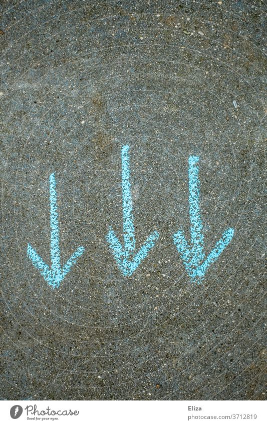 3 blue arrows pointing down, painted with chalk on asphalt. Downwards trend. Arrow downstairs Blue Direction Negative downtrend Balance sheet Chalk Asphalt