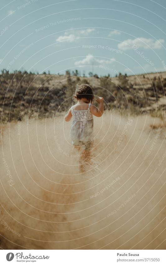 Rear view child playing in the fields Summer Summer vacation Travel photography travel Child childhood Children's game Nature Leisure and hobbies Exterior shot