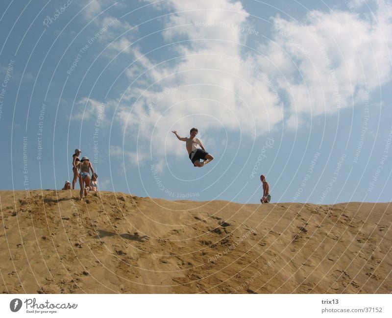 sand_jump_1 Jump Human being Vacation & Travel Clouds Summer Sand Sky Level Sun Tall