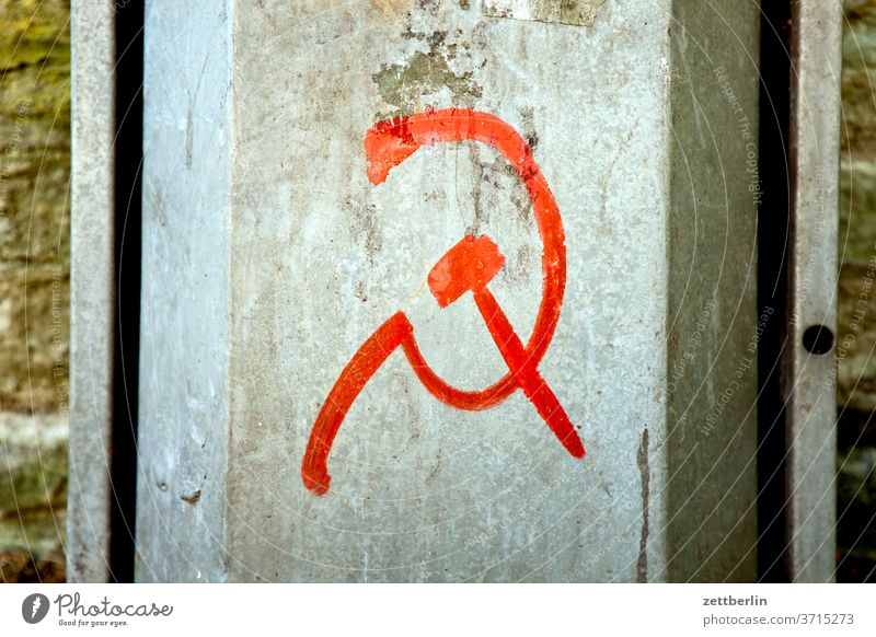 Call for revolution with hammer and sickle Old Revolution Construction site symbol world revolution proletariat Hammer Old town Ancient Architecture