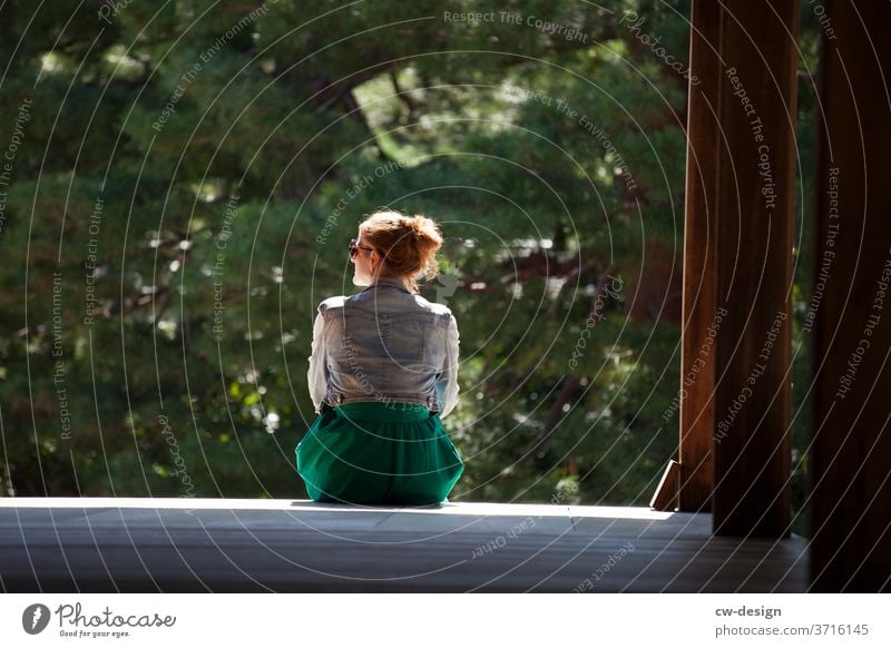 Woman in Japan Temple Exterior shot Colour photo