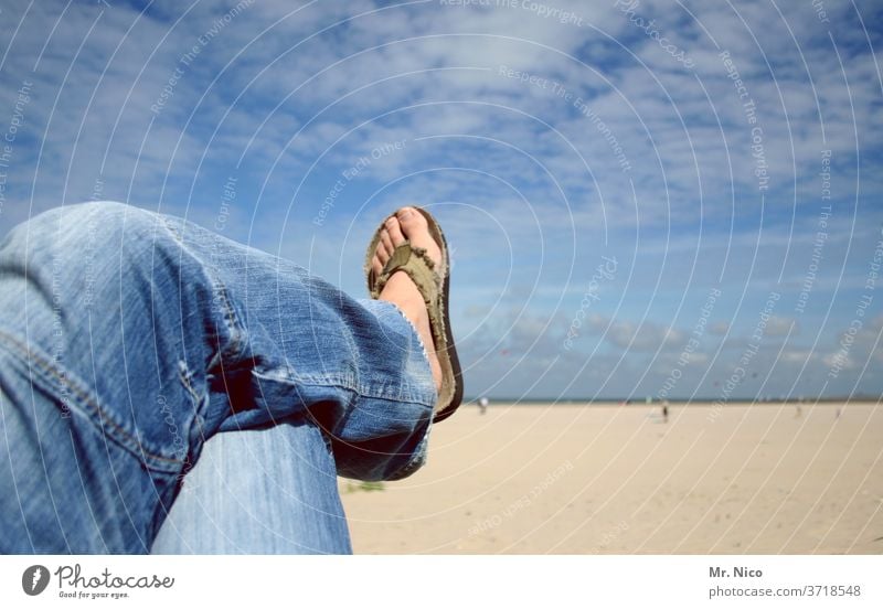 Hanging on the beach Beach Blue sky Clouds Jeans blue jeans Flip-flops Easygoing Relaxation Clothing Fashion Material Denim Lie feet Legs Lake Ocean Summer