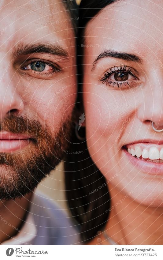 close up view of young happy couple together. Eyes close up. Love and family concept eyes portrait half 2 adult beautiful boyfriend caucasian city date dating