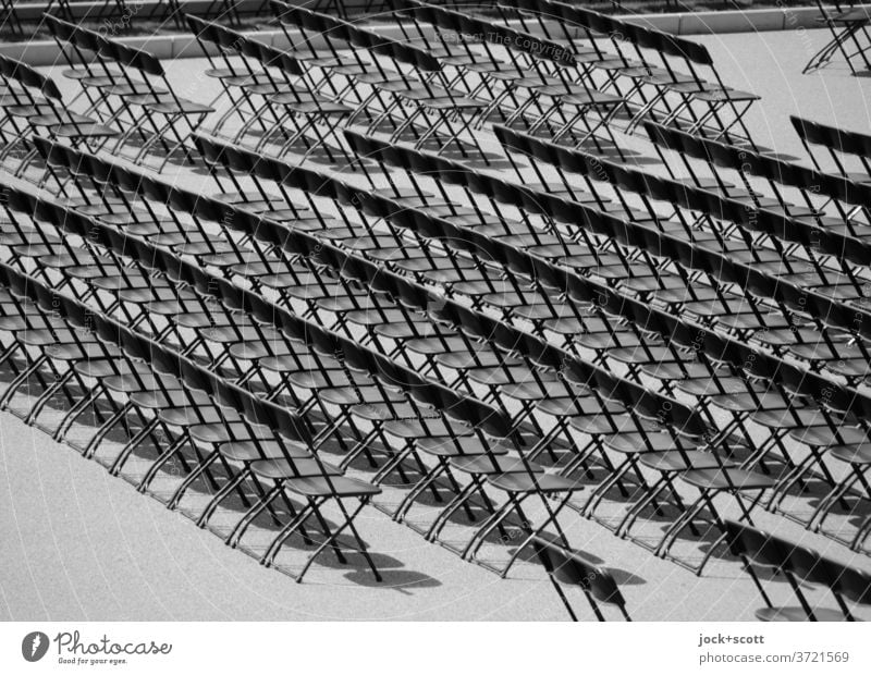 row after row of folding chairs Folding chair Row of seats Orderliness Equal Structures and shapes Symmetry Many Free Accuracy Seating Seating capacity