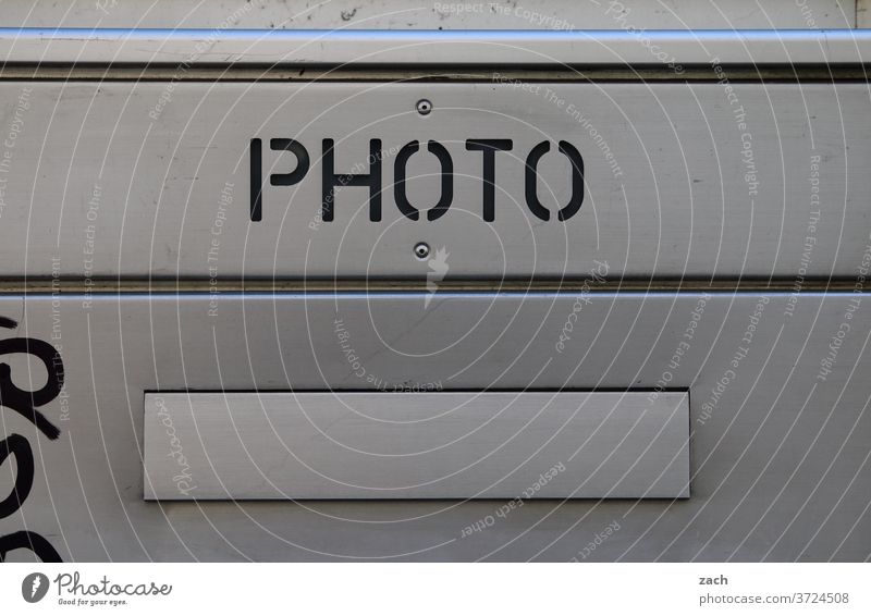 photocase street art Wall (barrier) Mural painting Facade embassy Letters (alphabet) Digits and numbers Mailbox Photography Take a photo Metal Box Slot