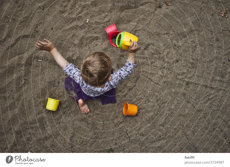 Sand child Sand toys Child Bird's-eye view Playing Toys Sandpit submerged Infancy Trickle Exterior shot Playground Children's game Toddler Day