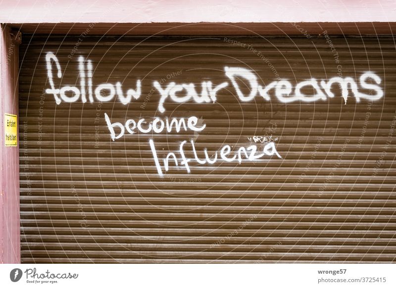 follow your Dreams - become Influenza | Graffito on a garage door Graffiti dreams Garage door Highway ramp (entrance)